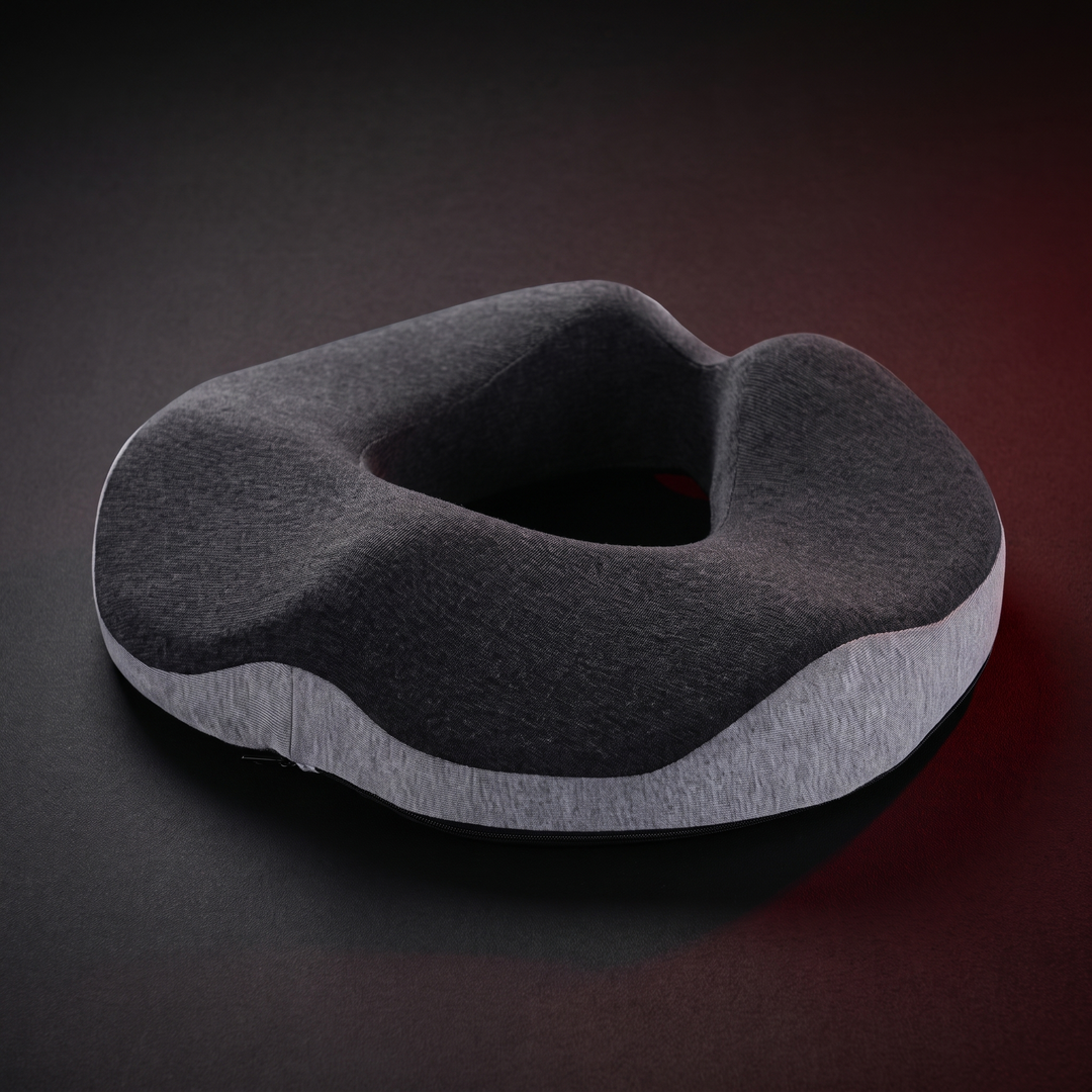 Memory foam donut seat cushion in dark with grey trim