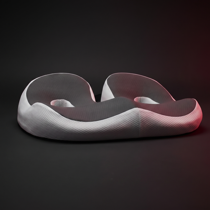 Ergonomic memory foam donut seat cushion with open-center cutout for pressure relief