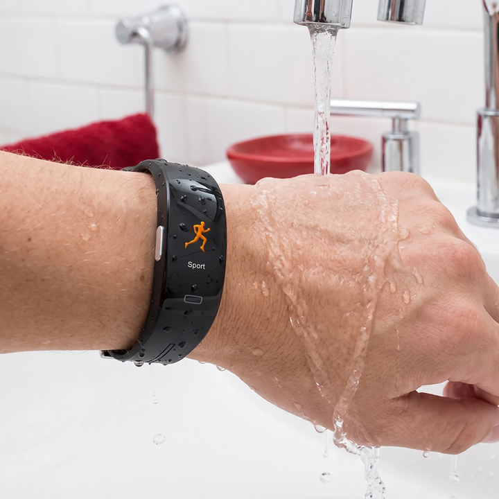 Waterproof smart fitness band splashed with water, built for sweat and rain