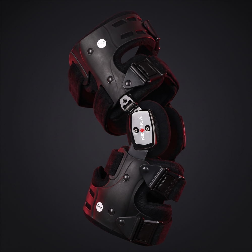 PHYSIOATHLETX adjustable knee brace with dual-hinge structural support, front hero view