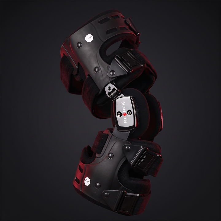 PHYSIOATHLETX adjustable knee brace with dual-hinge structural support, front hero view