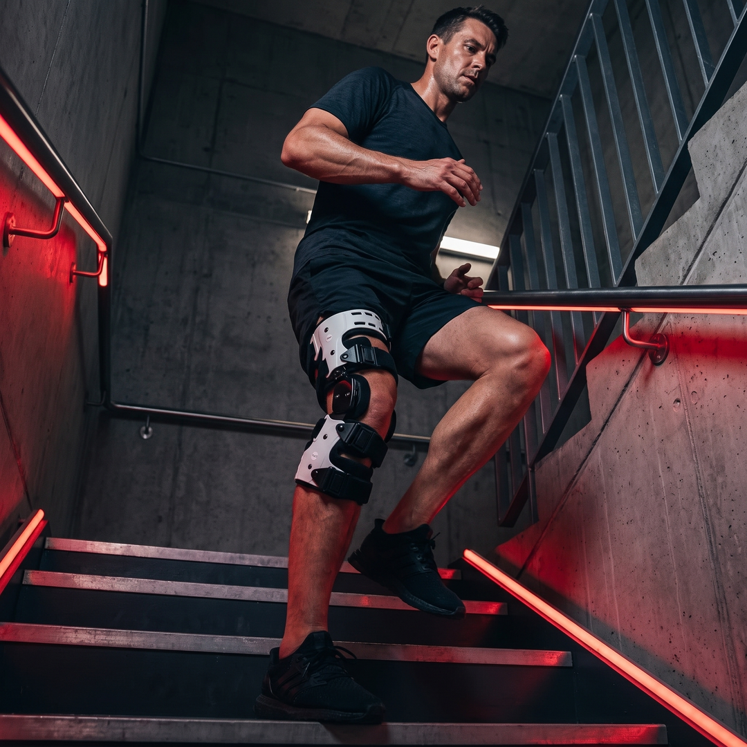 Adjustable OA Unloader Knee Brace - stair climbing lifestyle