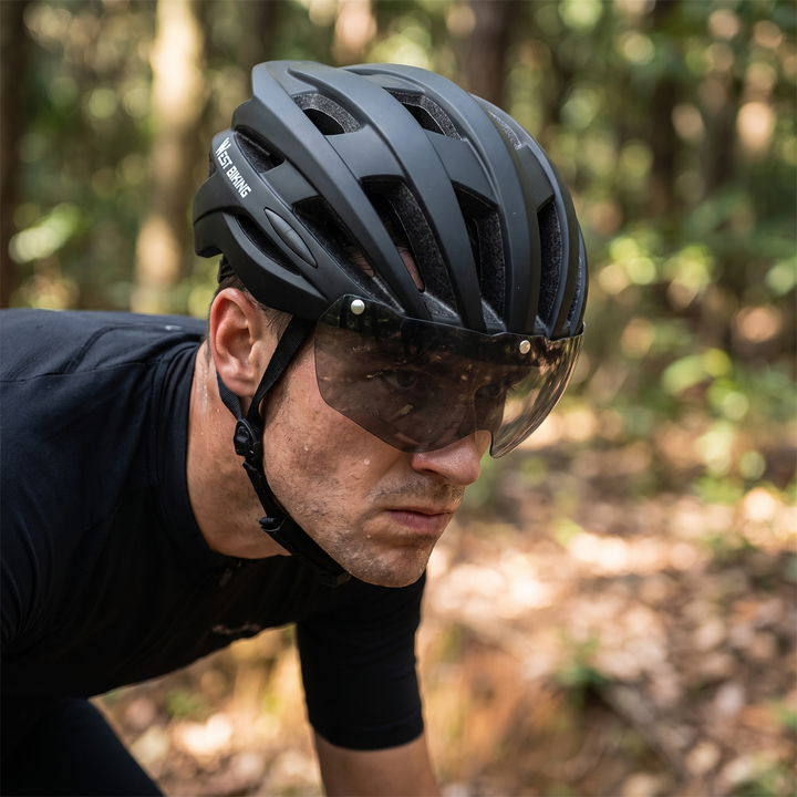 Close-Up Cyclist Wearing PHYSIOATHLETX Helmet with Magnetic Goggle Lens Down