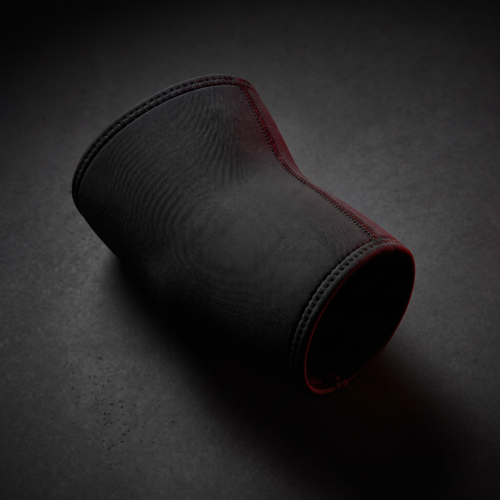 Professional Elbow Brace Compression Sleeve - black colorway studio shot