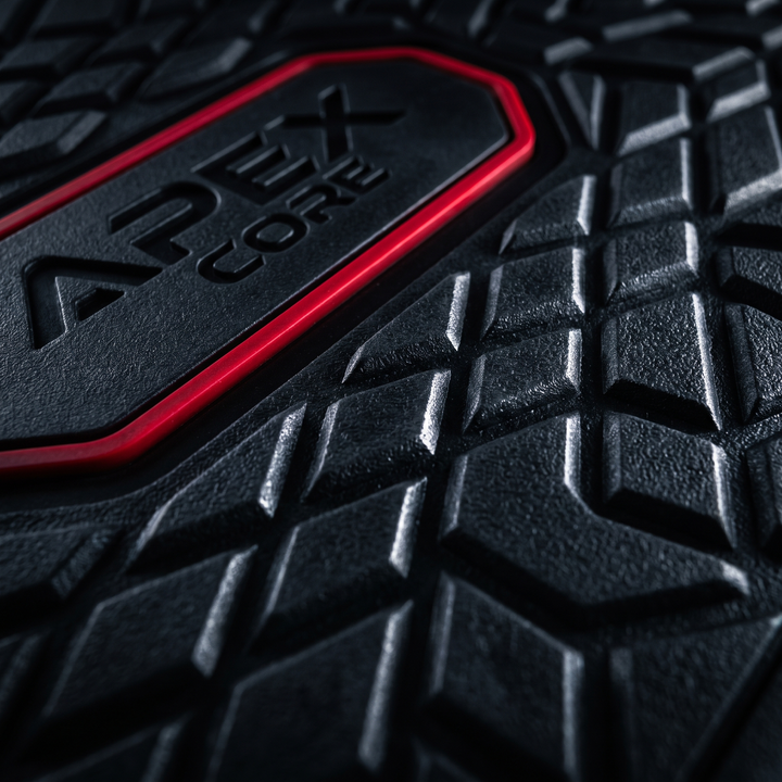 Macro detail of the non-slip grip texture on the vibration platform