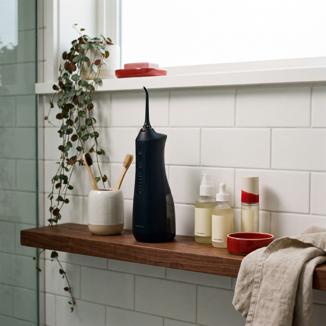 Cordless Water Flosser Oral Irrigator - Black - Bathroom Shelf Lifestyle