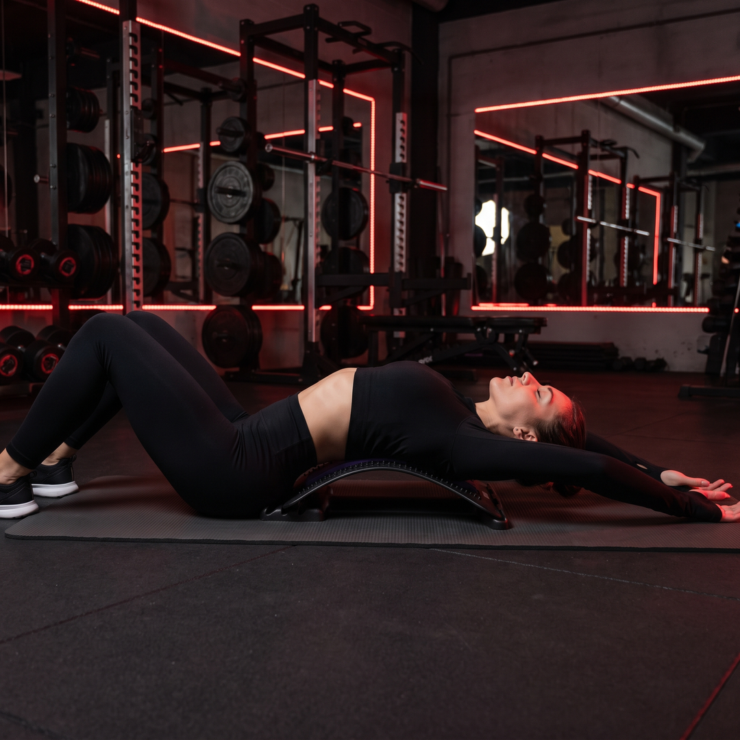 Woman Using Lumbar Support Pad for Muscle Relaxation Stretch