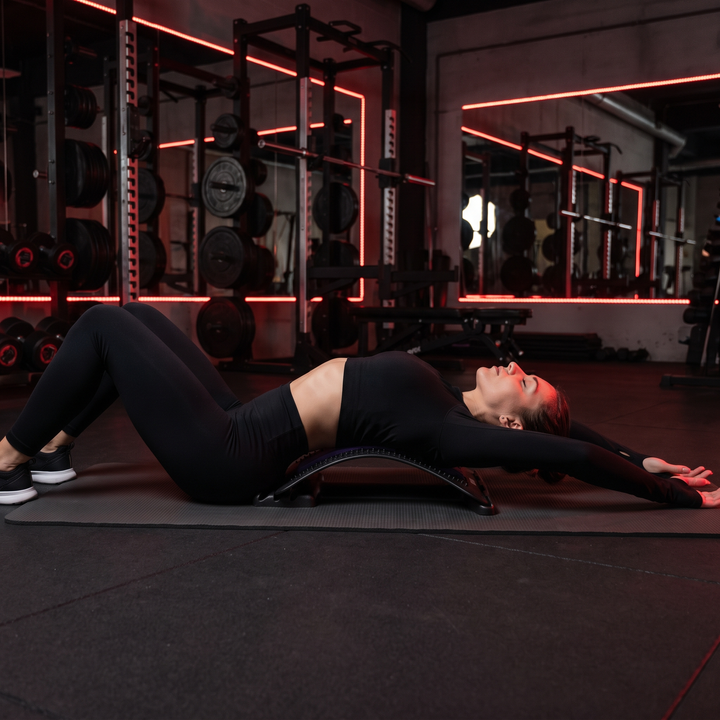 Woman Using Lumbar Support Pad for Muscle Relaxation Stretch