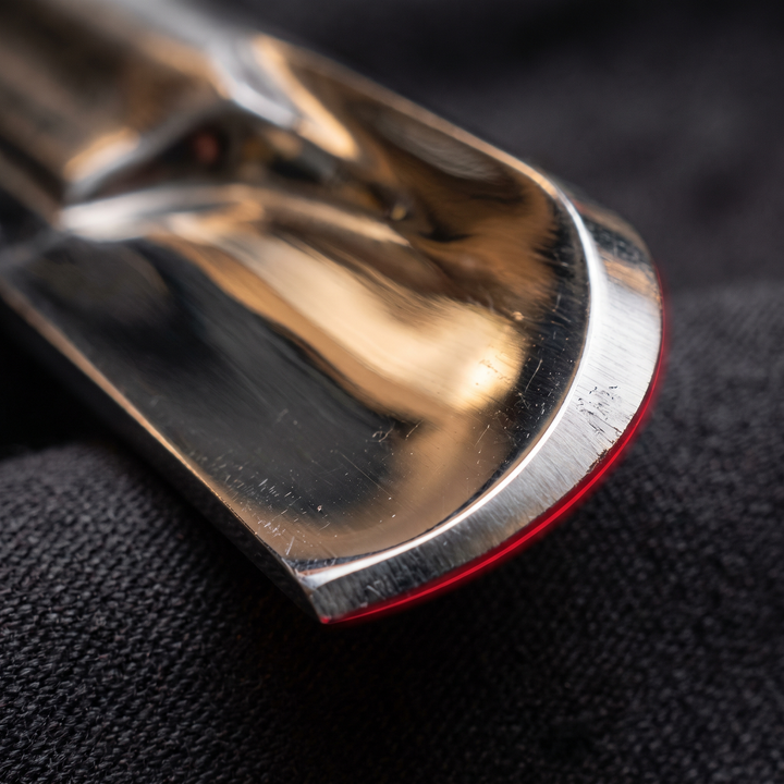 Stainless Steel Gua Sha Tool - Polished Edge Contour Macro Detail
