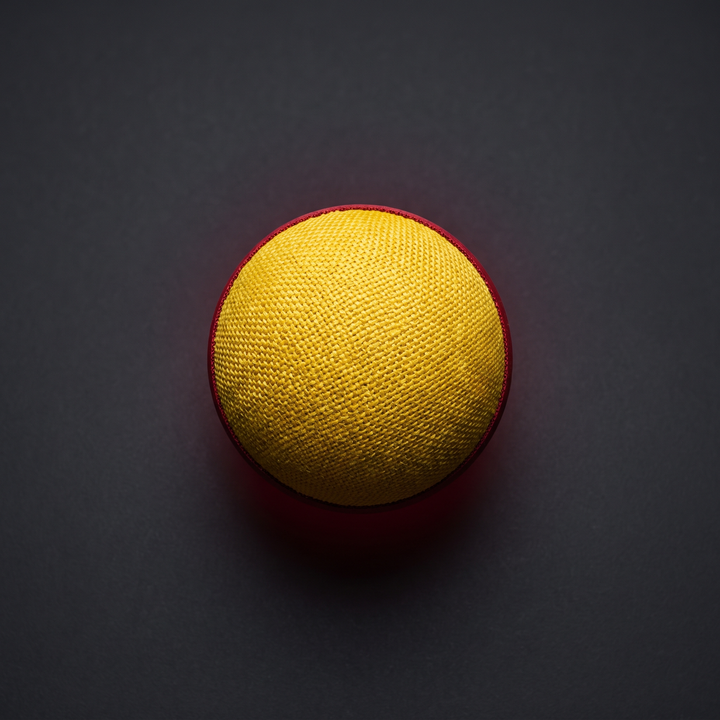 Hand Grip Strengthener Ball for Finger and Hand Strength Training - Yellow Cloth-Wrapped Grip Ball Hero Shot