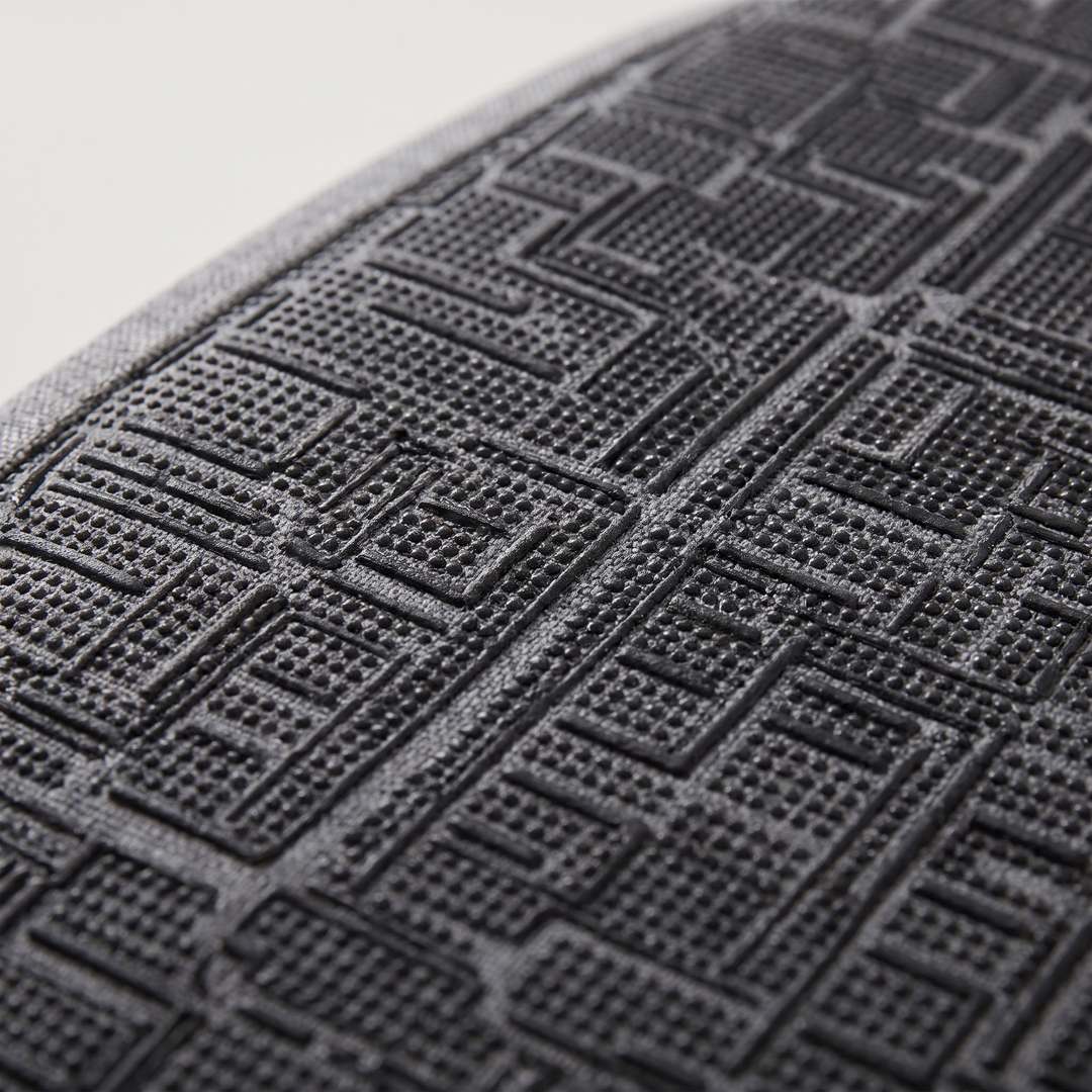 Close-up of non-slip base on seat cushion underside
