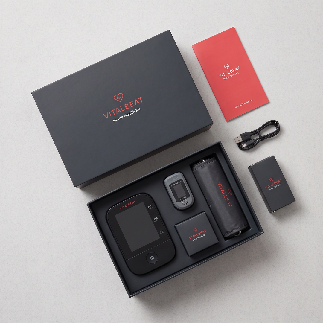 Flat lay of blood pressure monitor and pulse oximeter retail packaging