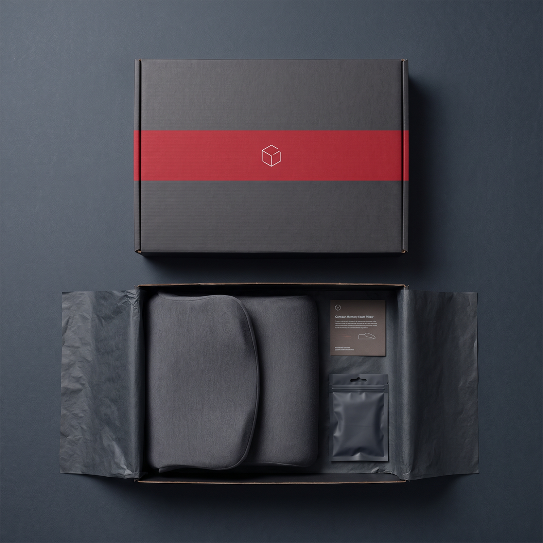 Flat lay of premium pillow packaging with contour memory foam pillow