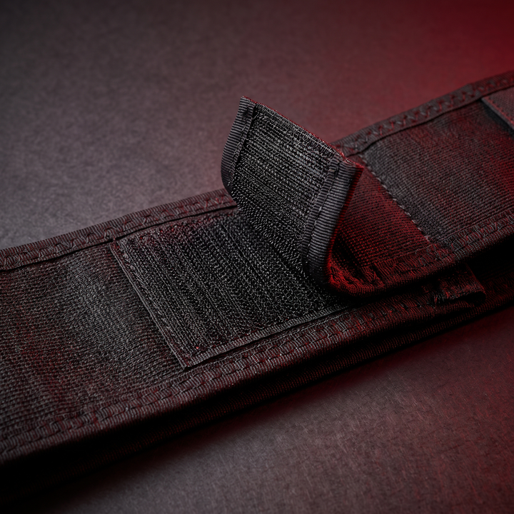 Close-up of secure closure fastening system engineered for all-day support on PHYSIOATHLETX black waist support belt