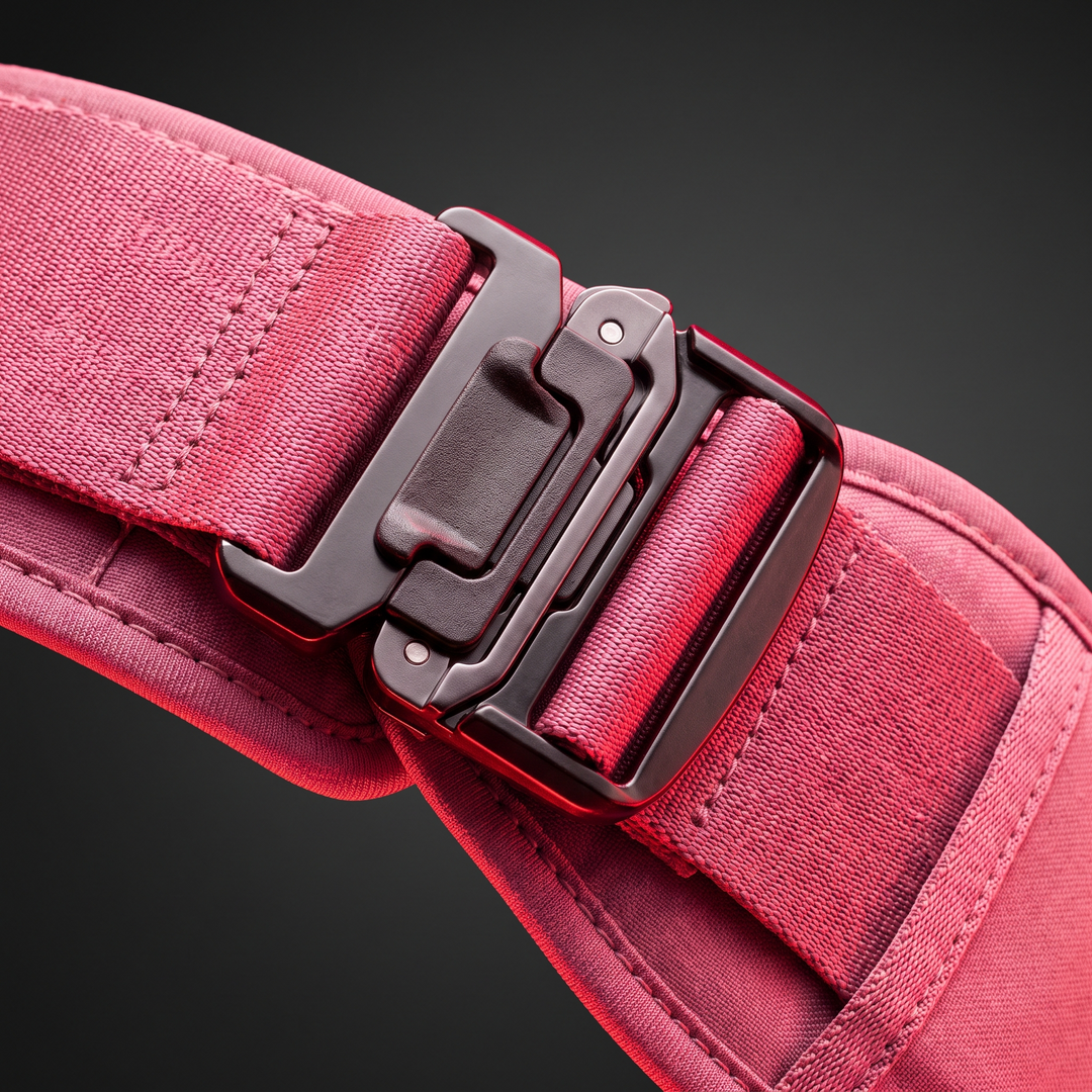 Close-up of adjustable compression strap system on PHYSIOATHLETX pink waist support belt