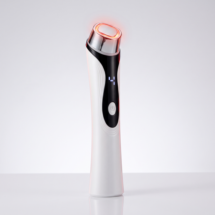 4-in-1 microcurrent facial device, front three-quarter view with LED-lit applicator tip