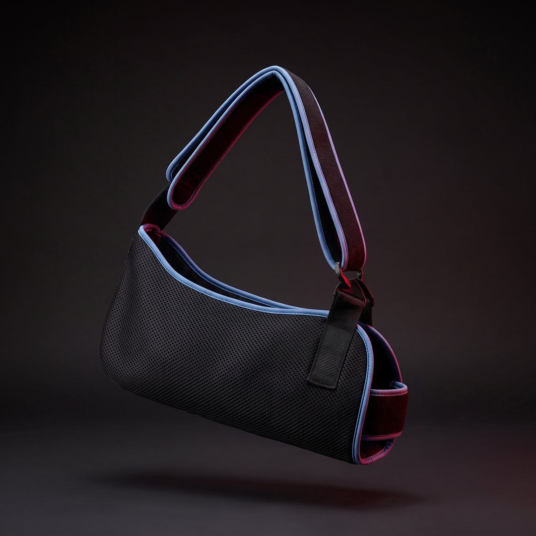 Adjustable arm support sling with forearm fixation strap and breathable fabric design