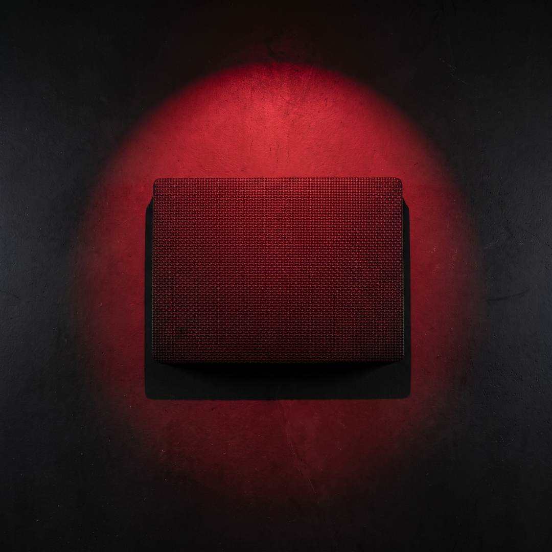 Top-down flatlay of black PHYSIOATHLETX balance training pad