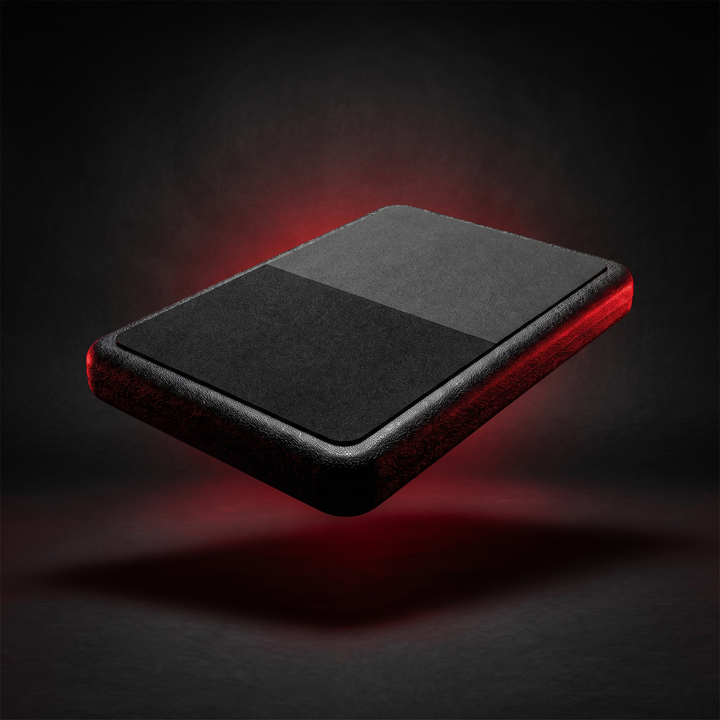 PHYSIOATHLETX black balance training pad, stability cushion hero product shot, dark-gym aesthetic