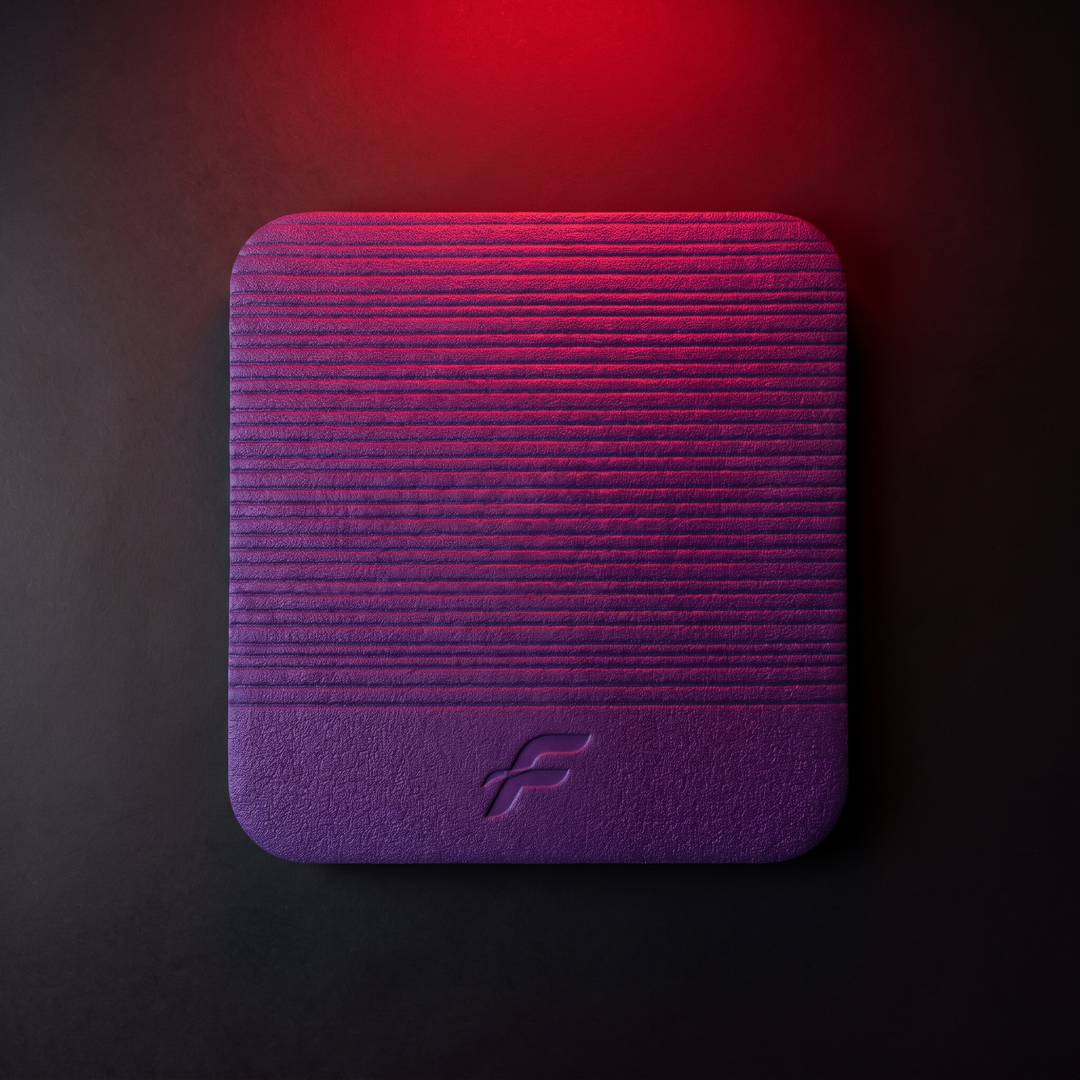 Top-down flatlay of purple PHYSIOATHLETX balance training pad