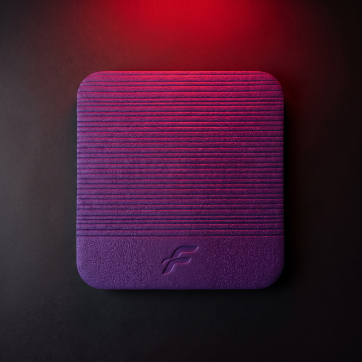 Top-down flatlay of purple PHYSIOATHLETX balance training pad
