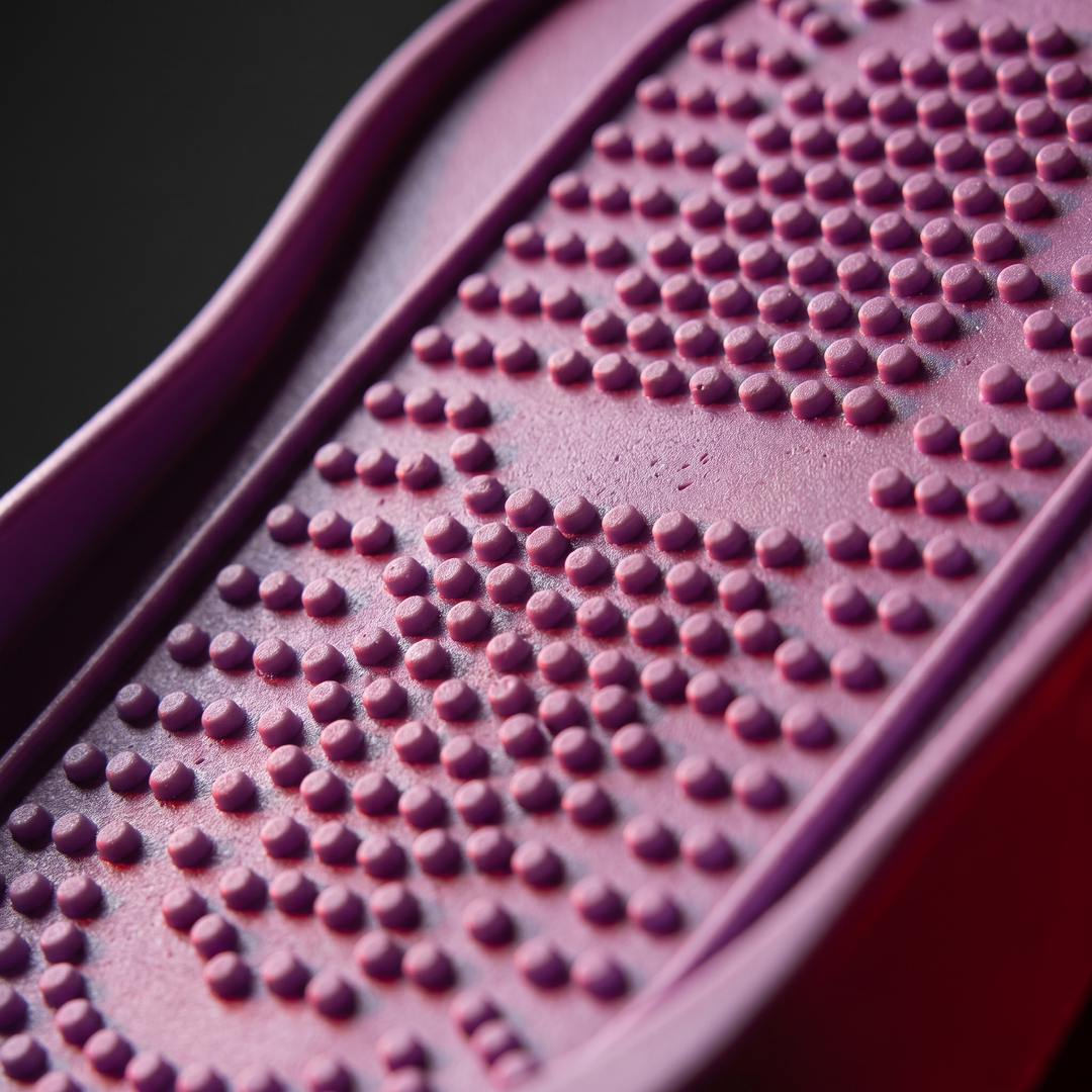 Macro close-up of the textured non-slip surface grip pattern