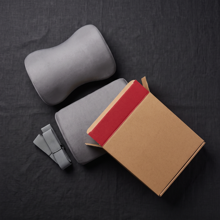Ergonomic Car Neck Pillow Memory Foam Headrest Cushion - gray packaging flat lay
