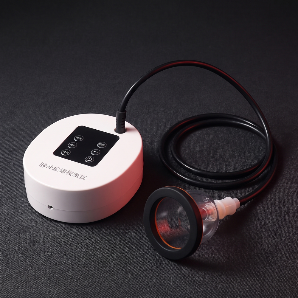 Electric cupping device control unit with connecting tubing, side view