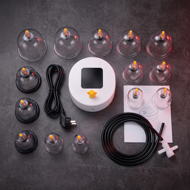 Complete electric cupping device kit with cups, tubing, and manual