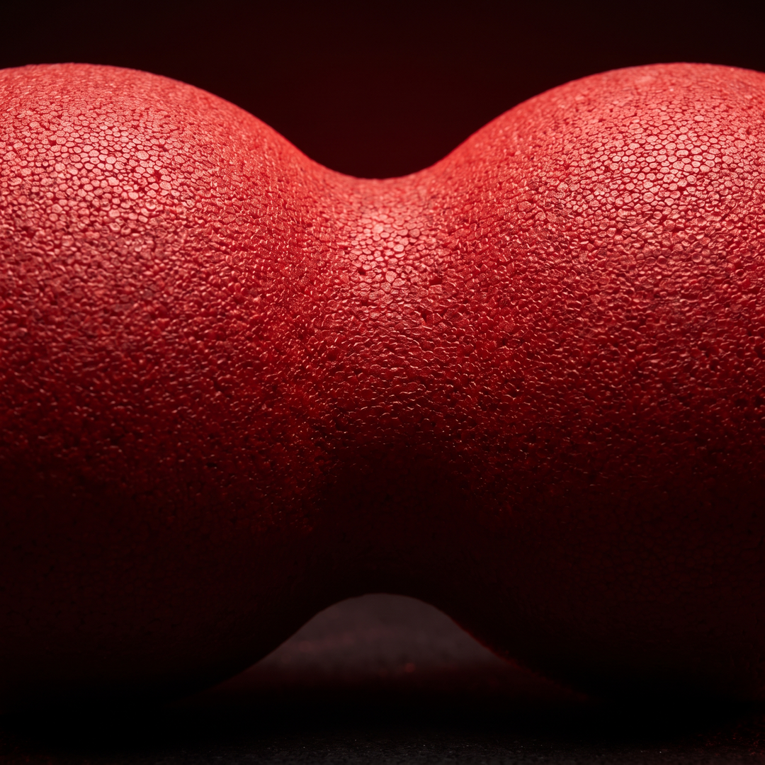 Close-up of high-density EPP foam texture on PHYSIOATHLETX peanut massage ball
