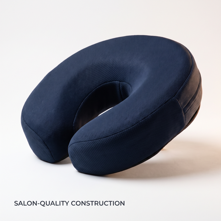 Navy blue memory foam massage table headrest cushion, angled detail view