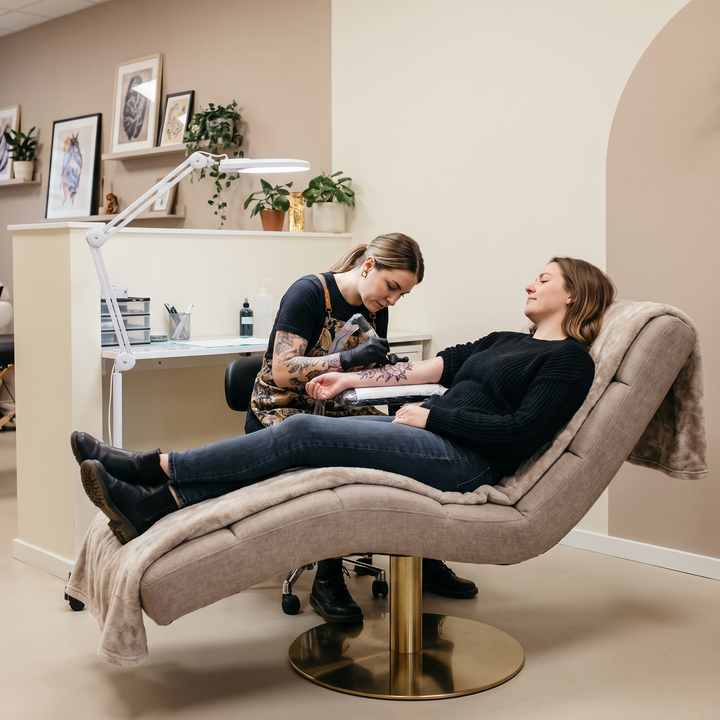 Professional Curved Reclining Facial Bed - Tattoo Treatment in Use