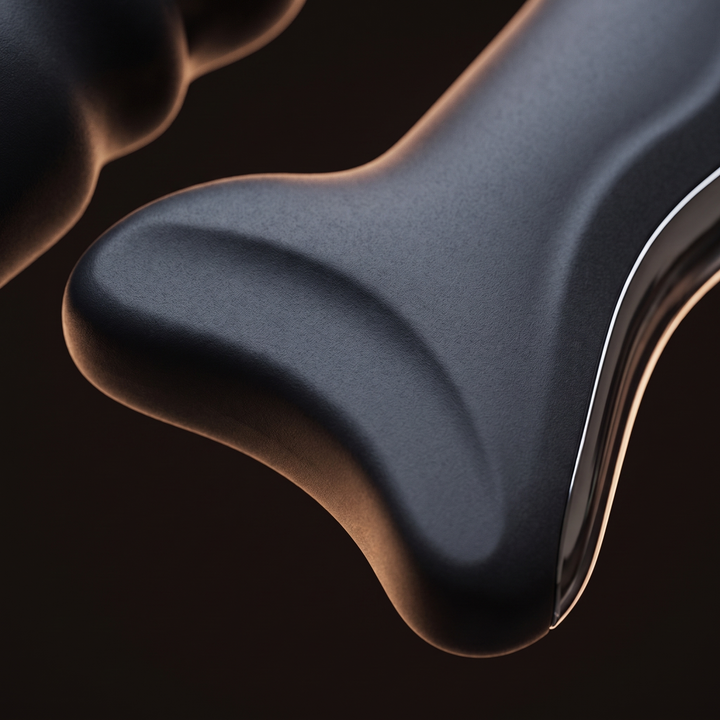Macro close-up of the smooth curved scraping edge surface of the recovery tool
