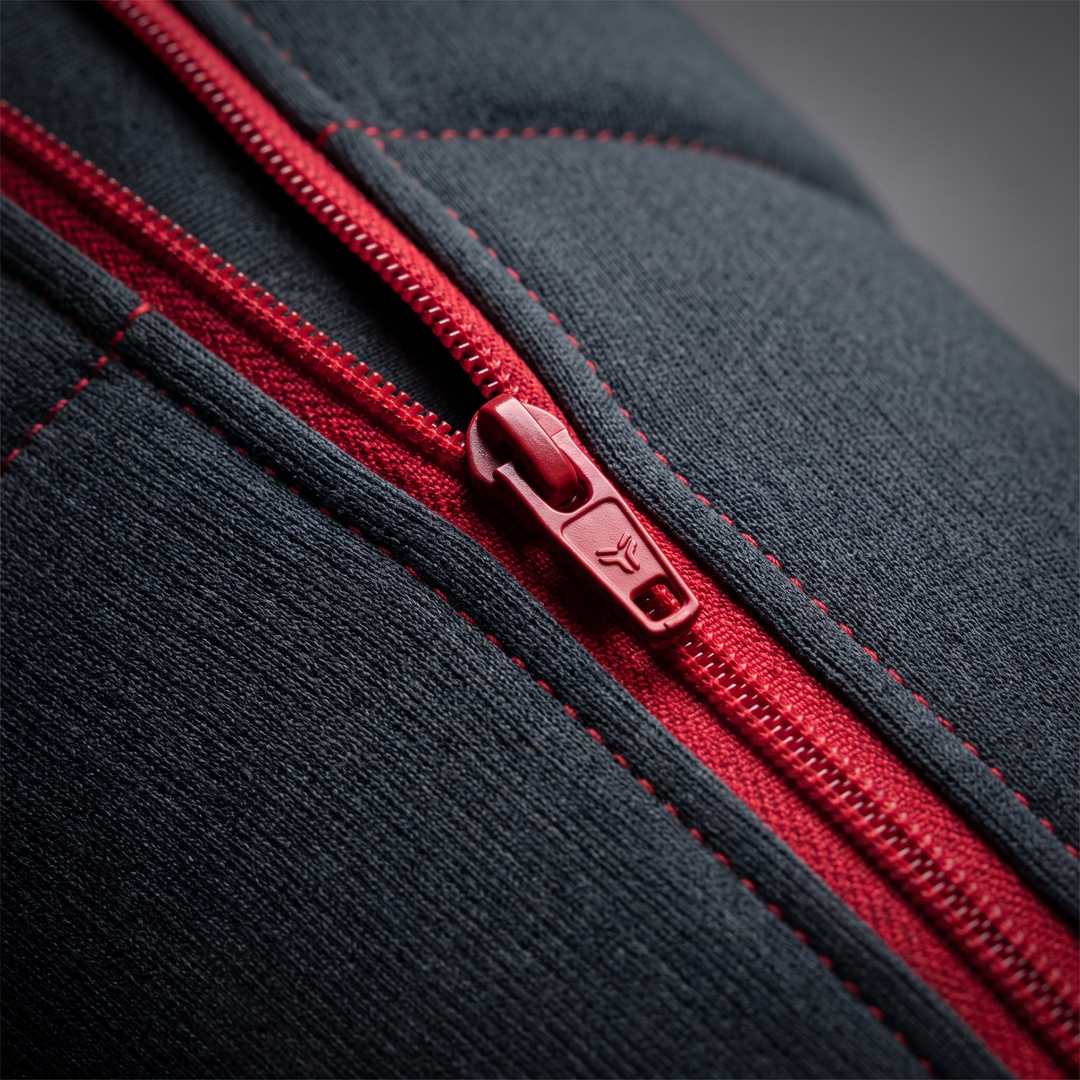 Zipper closure detail on the full-leg compression massager sleeve