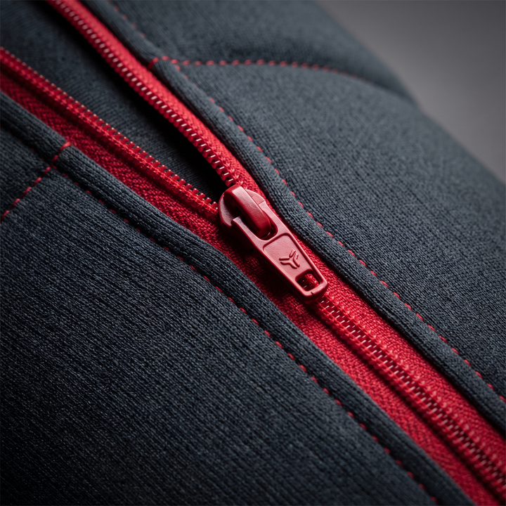 Zipper closure detail on the full-leg compression massager sleeve