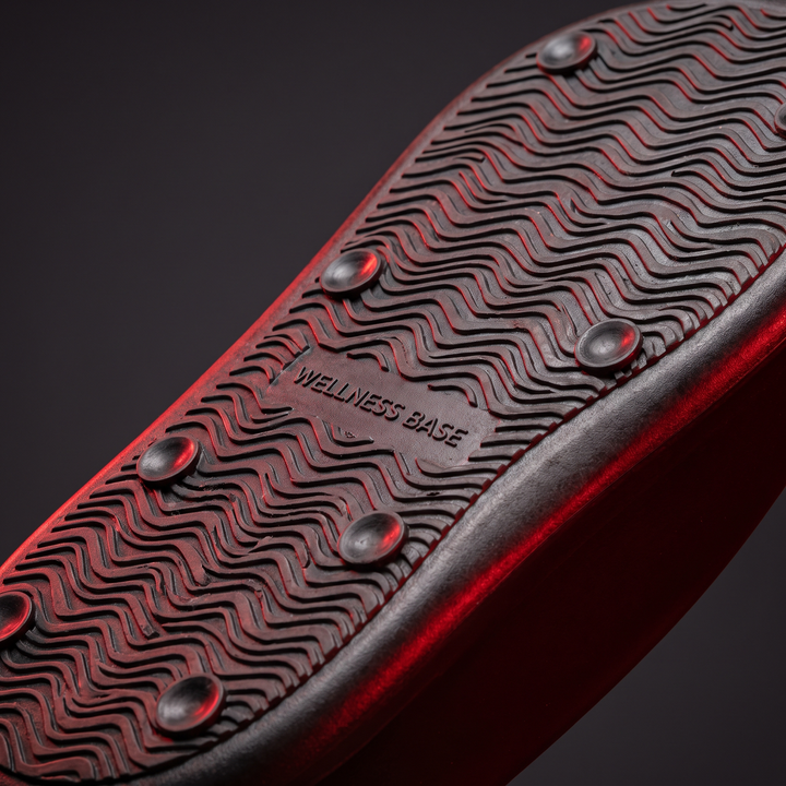 Underside of foot massage board showing non-slip grip base