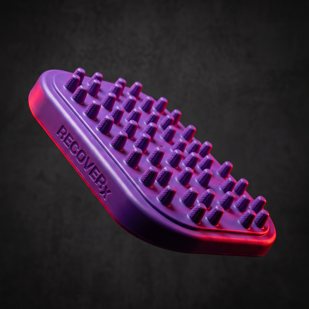 Purple textured foot massage board with raised pegs, angled hero shot on dark background