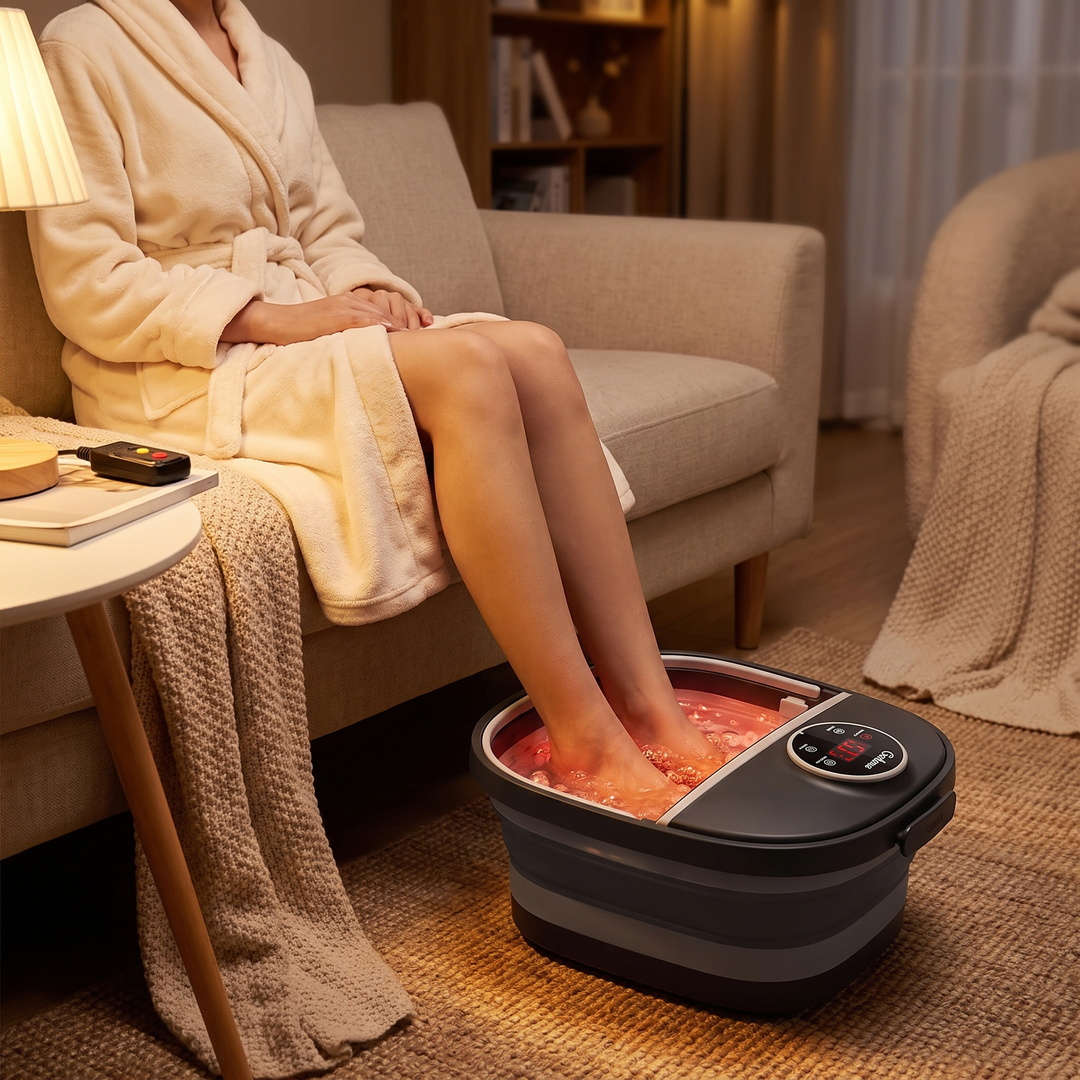 Collapsible Foot Spa Bath with Heat Bubbles - evening relaxation lifestyle soaking feet on sofa