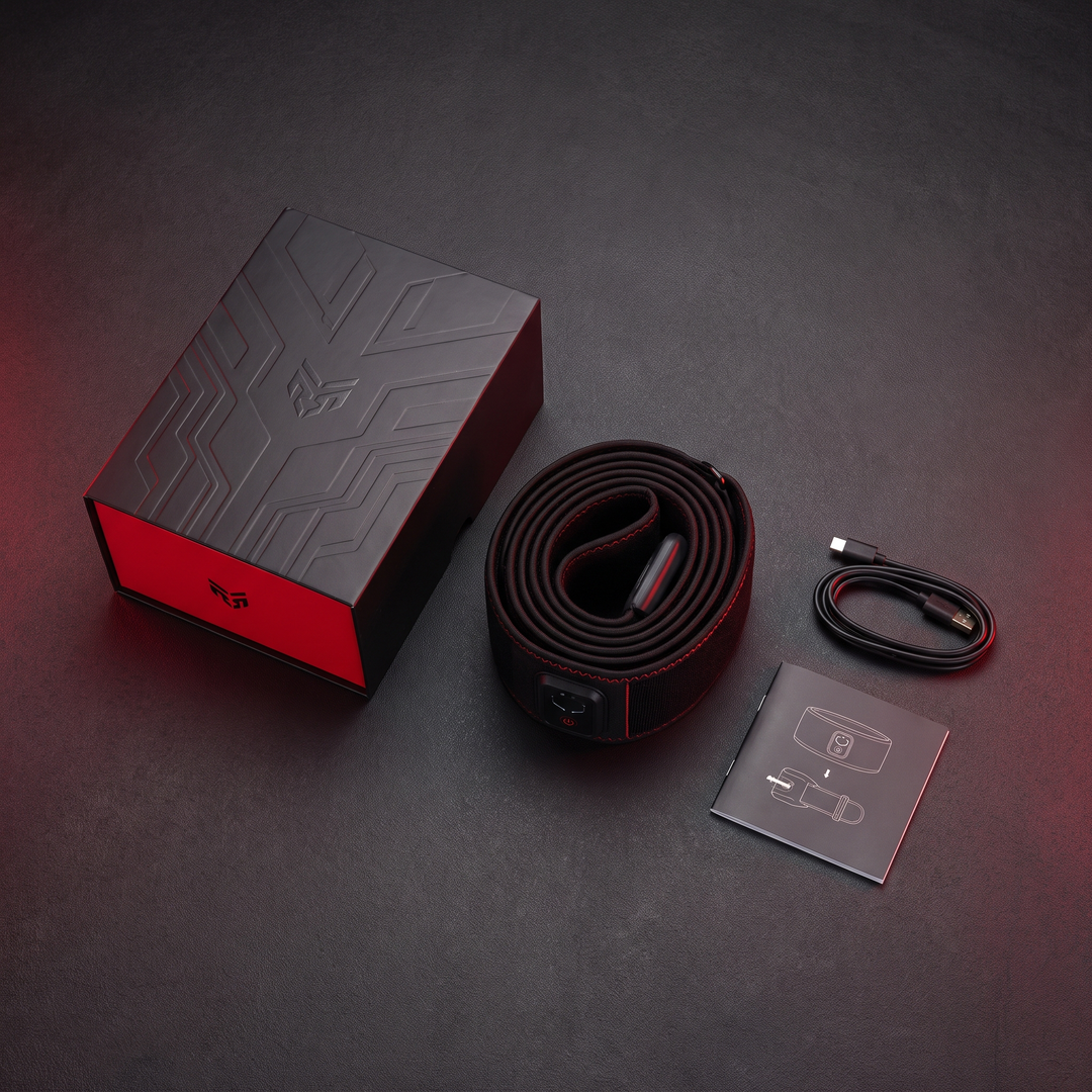 Alternate flat lay of waist recovery belt packaging and accessories