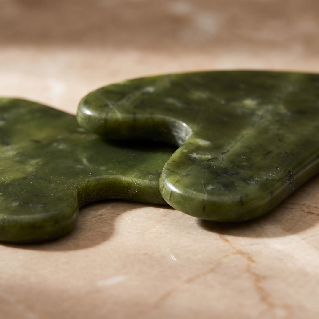 Close-up of heart-shaped gua sha tool&