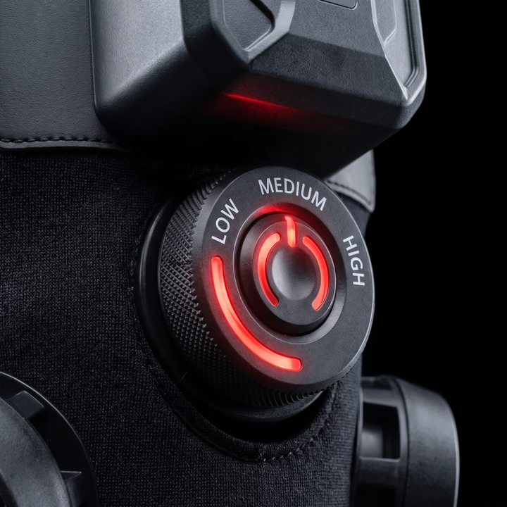 Close-up of the 3-level pressure dial on the knee recovery wrap