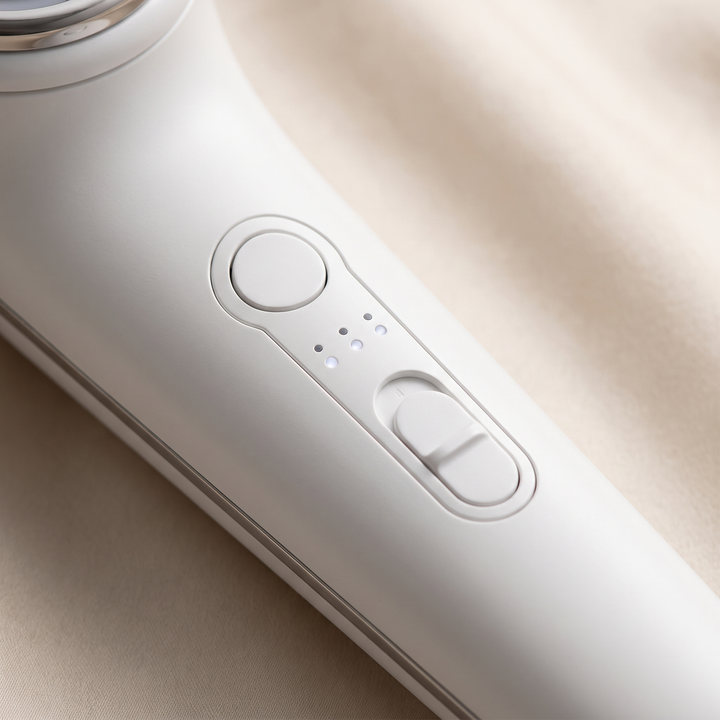 Professional LED Light Therapy Face Neck Massager - close-up of control button and vibration settings