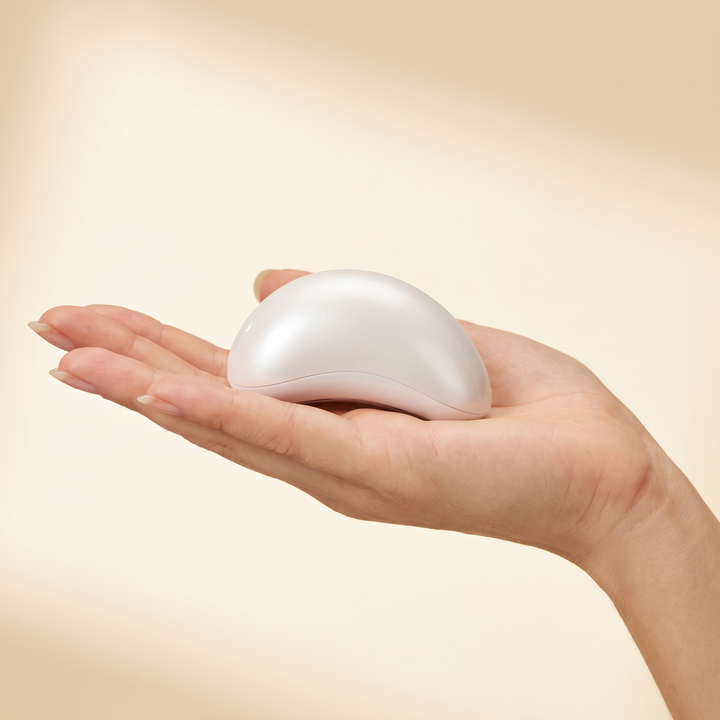 Professional LED Light Therapy Face Neck Massager - size reference in hand