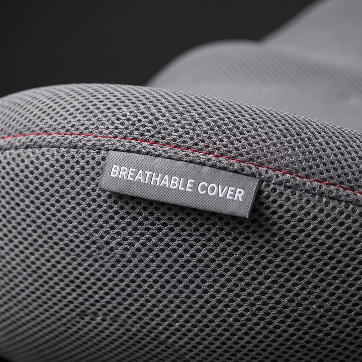 Close-up of the breathable fabric cover on the ergonomic lumbar support seat cushion