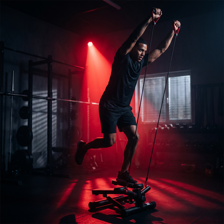 Heavy-Duty Mini Stepper with Resistance Bands LCD Monitor - lifestyle cardio training in dark home gym