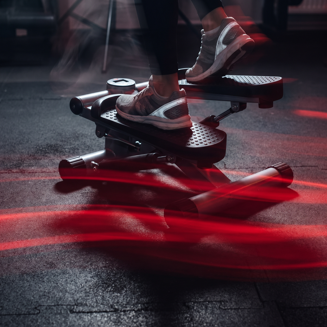 Heavy-Duty Mini Stepper with Resistance Bands LCD Monitor - close action shot feet on pedals