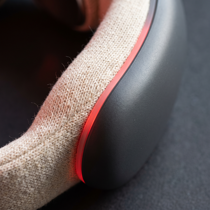 Close-up of the cream-coloured massager&