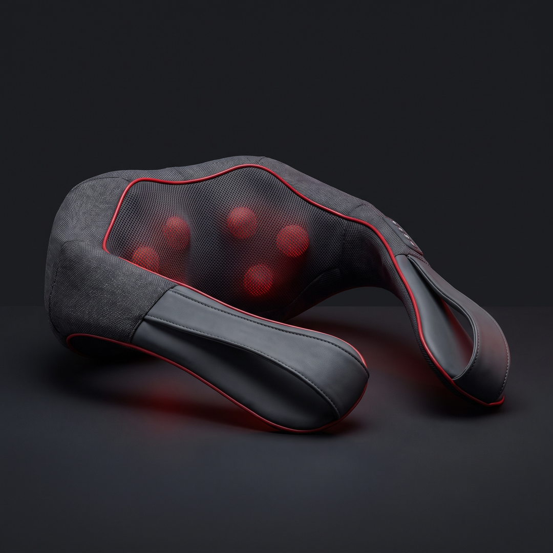 Gray neck and shoulder massager, angled view highlighting ergonomic shape and kneading nodes