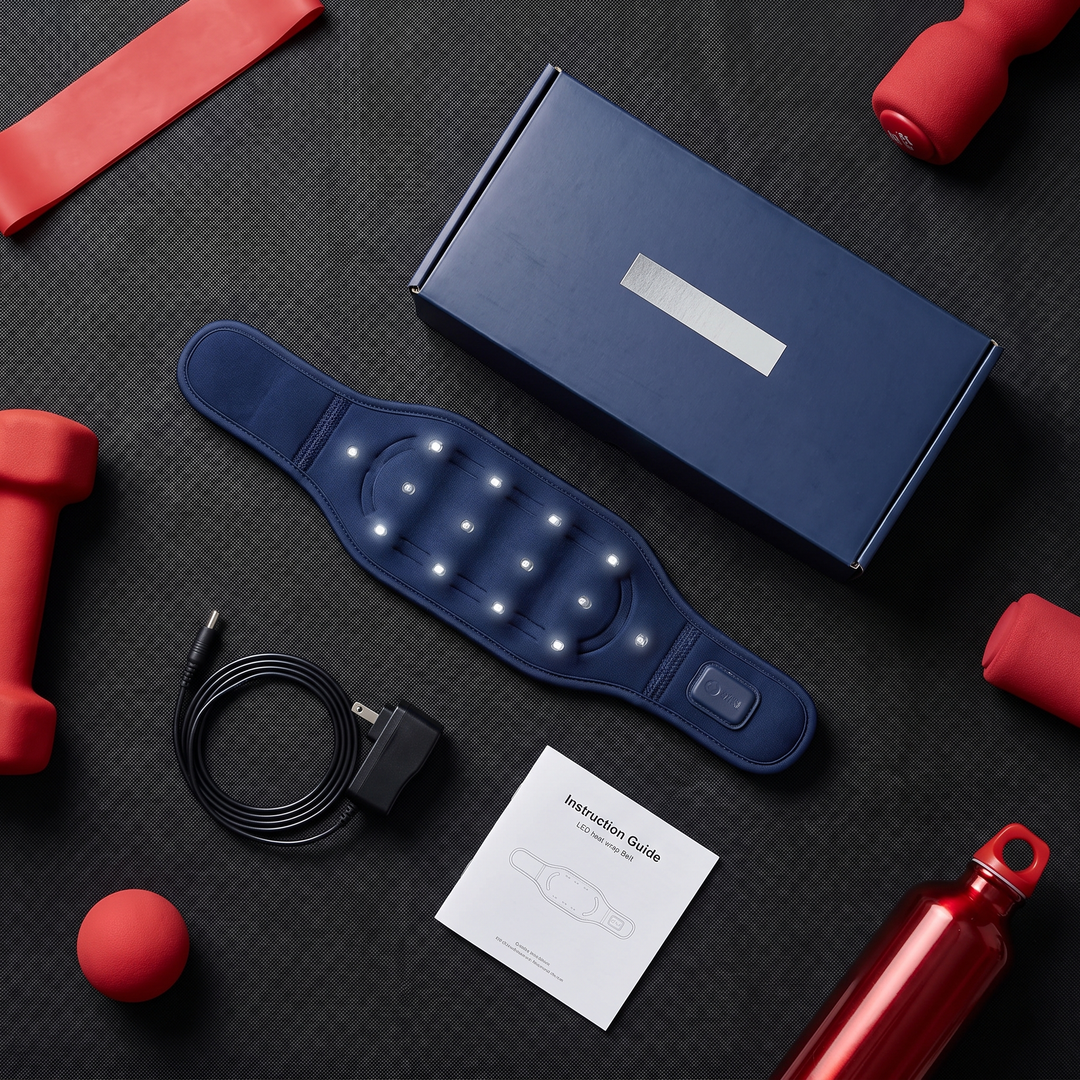 Flat lay of blue recovery heat wrap with box, power adapter cable, and instruction guide