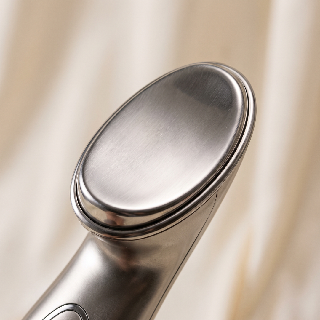 Applicator head detail of professional-grade skin massage device